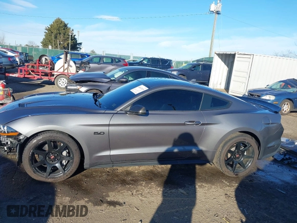 2021 Ford Mustang GT z VIN 1FA6P8CF9M5117126, wystawiony jako IAAI lot #41647619 z przebiegiem 31 076 mil mil oraz . Historia ofert i sprzedaży dostępna na DreamBid. Obrazek 15.