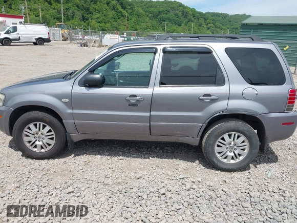2007 Mercury Mariner Luxury with VIN 4M2CU91157KJ09026, listed as a IAAI auction lot 42312495 with 156,572 mi miles and . Bid and sale history available at DreamBid. Image 14.