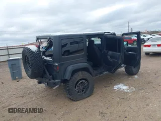 2017 Jeep Wrangler Unlimited Sport with VIN 1C4BJWDG4HL748681, listed as a IAAI auction lot 41265831 with 76,169 mi miles. Bid and sale history available at carsss.com. Image 4.