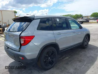 2021 Honda Passport Sport with VIN 5FNYF8H24MB004016, listed as a IAAI auction lot 41696379 with 85,373 mi miles and . Bid and sale history available at DreamBid. Image 4.
