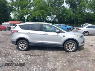 2017 Ford Escape SE z VIN 1FMCU9GD3HUA74463, wystawiony jako IAAI lot #42496171 z przebiegiem 160 534 mil mil oraz . Historia ofert i sprzedaży dostępna na DreamBid. Obrazek 13.