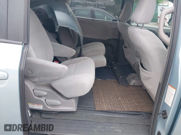 2015 Toyota Sienna LE AAS with VIN 5TDKK3DC4FS663876, listed as a IAAI auction lot 42155091 with 82,602 mi miles and . Bid and sale history available at DreamBid. Image 8.