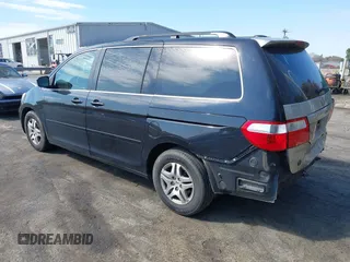 2005 Honda Odyssey EX-L with VIN 5FNRL38785B113074, listed as a IAAI auction lot 41907648 with 305,956 mi miles and . Bid and sale history available at DreamBid. Image 3.