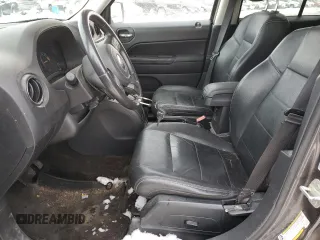 2015 Jeep Patriot North with VIN 1C4NJRAB7FD311725, listed as a Copart auction lot 82647074 with 185,560 mi miles and Salvage Title. Bid and sale history available at carsss.com. Image 7.