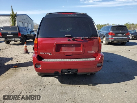 2006 GMC Envoy Denali z VIN 1GKES66M266119739, wystawiony jako Copart lot #48015465 z przebiegiem 159 822 mil mil oraz Szkoda całkowita • Salvage title. Historia ofert i sprzedaży dostępna na DreamBid. Obrazek 6.