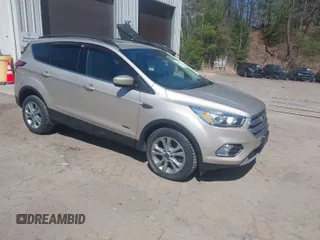 2017 Ford Escape SE with VIN 1FMCU9GD1HUD23228, listed as a IAAI auction lot 42074213 with 115,757 mi miles. Bid and sale history available at carsss.com. Image 1.