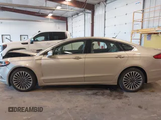 2018 Ford Fusion Titanium с VIN 3FA6P0D9XJR246737, выставлен на аукционе IAAI как лот 42274631 с пробегом 88 247 миль миль и . История ставок и продаж доступна на DreamBid. Изображение 14.