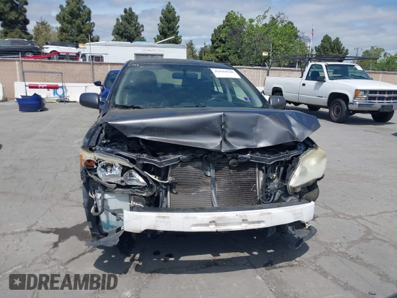 2013 Toyota Corolla L with VIN JTDBU4EE2DJ113876, listed as a IAAI auction lot 42044548 with 232,500 mi miles. Bid and sale history available at carsss.com. Image 13.