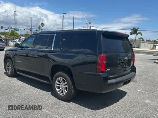 2018 Chevrolet Suburban LS with VIN 1GNSCGKC7JR316242, listed as a Copart auction lot 55782715 with 239,977 mi miles and Clean Title. Bid and sale history available at carsss.com. Image 3.