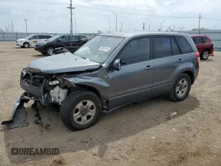 2007 Suzuki Grand Vitara z VIN JS3TD941374205230, wystawiony jako Copart lot #68392194 z przebiegiem 129 455 mil mil oraz Szkoda całkowita • Salvage title. Historia ofert i sprzedaży dostępna na DreamBid. Obrazek 1.