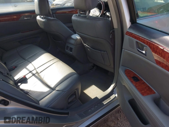 2005 Toyota Avalon XL z VIN 4T1BK36B95U050498, wystawiony jako IAAI lot #42220560 z przebiegiem 140 222 mil mil oraz . Historia ofert i sprzedaży dostępna na DreamBid. Obrazek 8.