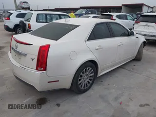 2013 Cadillac CTS Luxury z VIN 1G6DE5E53D0178112, wystawiony jako IAAI lot #41753094 z przebiegiem 262 955 mil mil oraz . Historia ofert i sprzedaży dostępna na DreamBid. Obrazek 4.