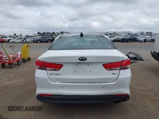 2016 Kia Optima EX with VIN 5XXGU4L31GG086203, listed as a IAAI auction lot 42128099 with 157,988 mi miles. Bid and sale history available at carsss.com. Image 16.