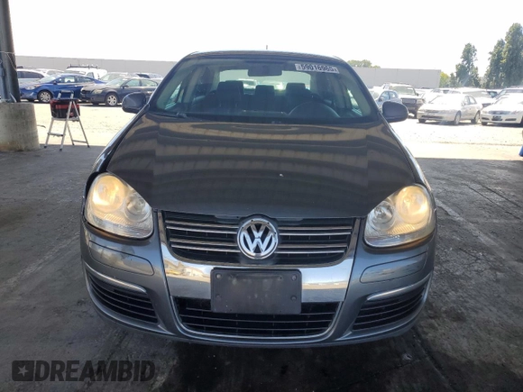 2010 Volkswagen Jetta S with VIN 3VWJZ7AJ9AM052569, listed as a Copart auction lot 59016965 with 166,950 mi miles and Salvage title. Bid and sale history available at DreamBid. Image 5.