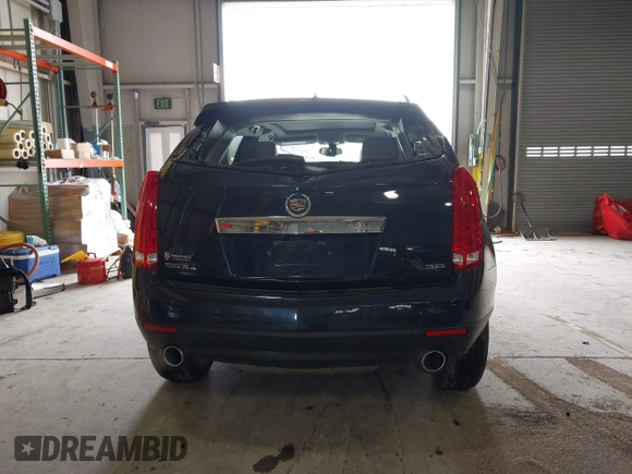2016 Cadillac SRX Luxury Collection z VIN 3GYFNEE38GS565721, wystawiony jako IAAI lot #41963005 z przebiegiem 87 005 mil mil oraz . Historia ofert i sprzedaży dostępna na DreamBid. Obrazek 16.
