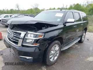 2015 Chevrolet Suburban LTZ with VIN 1GNSCKKC6FR271675, listed as a IAAI auction lot 41915036 with 150,917 mi miles. Bid and sale history available at carsss.com. Image 2.
