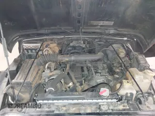 1999 Jeep Wrangler Sahara z VIN 1J4FY49S4XP432567, wystawiony jako IAAI lot #41562455 z przebiegiem Nie podano mil oraz . Historia ofert i sprzedaży dostępna na DreamBid. Obrazek 10.