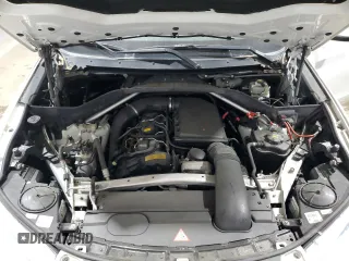 2014 BMW X5 xDrive35i z VIN 5UXKR0C5XE0K43083, wystawiony jako Copart lot #59182445 z przebiegiem 163 171 mil mil oraz Szkoda całkowita • Salvage title. Historia ofert i sprzedaży dostępna na DreamBid. Obrazek 12.