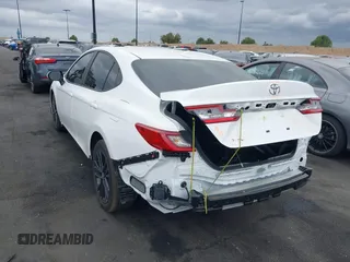 2025 Toyota Camry LE with VIN 4T1DAACK3SU087725, listed as a IAAI auction lot 42067493 with 3,217 mi miles and . Bid and sale history available at DreamBid. Image 3.
