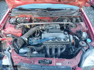 1998 Honda Civic EX with VIN 1HGEJ8148WL130488, listed as a IAAI auction lot 41119419 with 185,532 mi miles. Bid and sale history available at carsss.com. Image 10.
