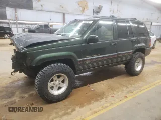 1995 Jeep Grand Cherokee Limited with VIN 1J4GZ78S7SC766726, listed as a Copart auction lot 84909134 with 174,256 mi miles and Salvage Title. Bid and sale history available at carsss.com. Image 1.