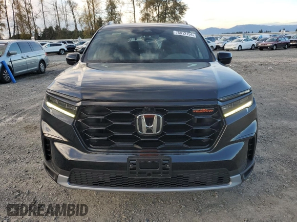 2023 Honda Pilot TrailSport with VIN 5FNYG1H63PB017335, listed as a Copart auction lot 75012154 with 5,870 mi miles and Salvage Title. Bid and sale history available at carsss.com. Image 5.