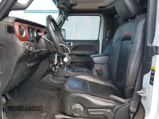 2021 Jeep Wrangler Rubicon z VIN 1C4HJXCG6MW713859, wystawiony jako Copart lot #72422884 z przebiegiem 52 627 mil mil oraz Szkoda całkowita • Salvage title. Historia ofert i sprzedaży dostępna na DreamBid. Obrazek 7.