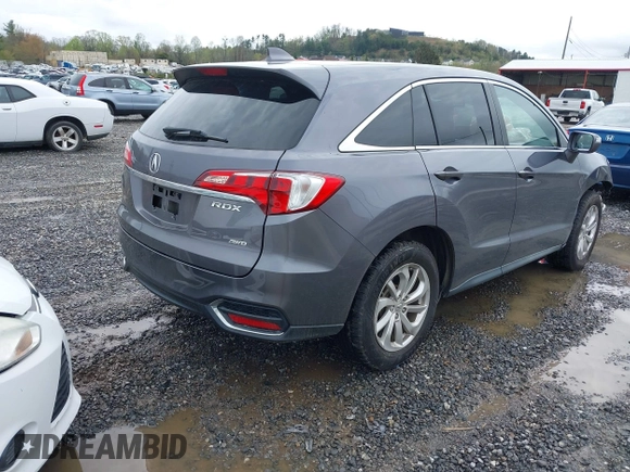 2018 Acura RDX Technology with VIN 5J8TB4H51JL010679, listed as a IAAI auction lot 41973440 with 97,643 mi miles and . Bid and sale history available at carsss.com. Image 4.