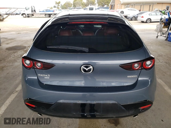 2024 Mazda 3 S Carbon Edition с VIN JM1BPBLM5R1701011, выставлен на аукционе Copart как лот 47946365 с пробегом 27 132 миль миль и Списание • Salvage title. История ставок и продаж доступна на DreamBid. Изображение 6.