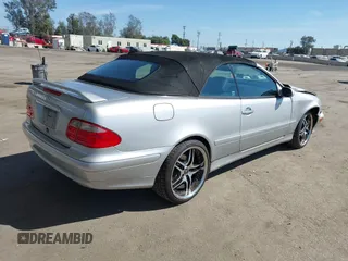 2000 Mercedes-Benz CLK with VIN WDBLK65G7YT051620, listed as a IAAI auction lot 41870818 with 141,676 mi miles. Bid and sale history available at carsss.com. Image 4.