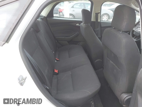 2017 Ford Focus SE z VIN 1FADP3F26HL233226, wystawiony jako IAAI lot #42004148 z przebiegiem 75 180 mil mil oraz . Historia ofert i sprzedaży dostępna na DreamBid. Obrazek 8.