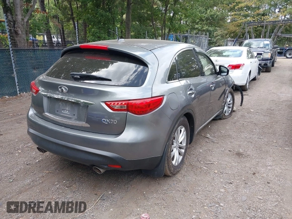 2014 Infiniti QX70 with VIN JN8CS1MW9EM413406, listed as a IAAI auction lot 40269302 with 123,957 mi miles and . Bid and sale history available at DreamBid. Image 4.