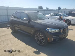 2020 BMW X3 M40i with VIN 5UXTY9C01L9B03869, listed as a Copart auction lot 46637515 with 57,052 mi miles and Salvage Title. Bid and sale history available at DreamBid. Image 4.