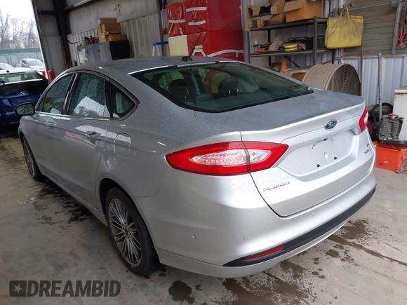 2013 Ford Fusion SE Hybrid with VIN 3FA6P0LU2DR319335, listed as a IAAI auction lot 42007573 with 135,099 mi miles. Bid and sale history available at carsss.com. Image 3.
