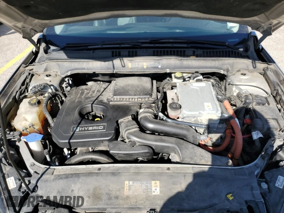 2016 Ford Fusion Titanium Hybrid with VIN 3FA6P0RU0GR153294, listed as a Copart auction lot 52723515 with 117,570 mi miles and Salvage title. Bid and sale history available at DreamBid. Image 12.