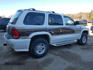 1998 Dodge Durango z VIN 1B4HS28Y6WF213556, wystawiony jako Copart lot #78912214 z przebiegiem 50 466 mil mil oraz Nie do naprawy. Historia ofert i sprzedaży dostępna na DreamBid. Obrazek 3.