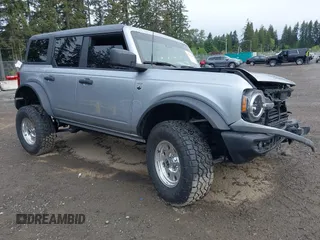 2024 Ford Bronco Big Bend z VIN 1FMDE7BH9RLB24788, wystawiony jako IAAI lot #42282118 z przebiegiem 7 041 mil mil oraz . Historia ofert i sprzedaży dostępna na DreamBid. Obrazek 1.