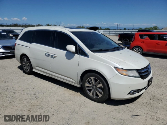 2017 Honda Odyssey Touring z VIN 5FNRL5H93HB015863, wystawiony jako Copart lot #56926815 z przebiegiem 267 380 mil mil oraz Szkoda całkowita • Salvage title. Historia ofert i sprzedaży dostępna na DreamBid. Obrazek 4.