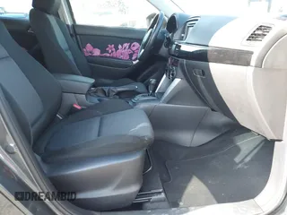2014 Mazda CX-5 Sport with VIN JM3KE2BE8E0313407, listed as a IAAI auction lot 41215428 with 120,387 mi miles and . Bid and sale history available at carsss.com. Image 5.