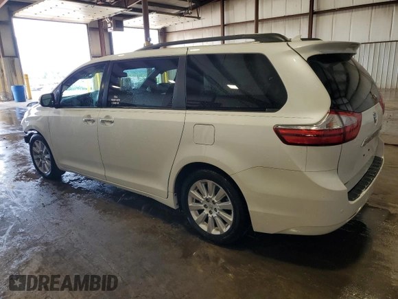 2015 Toyota Sienna XLE with VIN 5TDYK3DC4FS688299, listed as a Copart auction lot 61793155 with 57,197 mi miles and Salvage title. Bid and sale history available at DreamBid. Image 2.