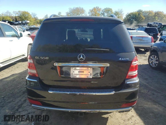 2011 Mercedes-Benz GL-Class GL 550 with VIN 4JGBF8GE2BA696439, listed as a Copart auction lot 74685374 with 56,766 mi miles and Salvage Title. Bid and sale history available at carsss.com. Image 6.