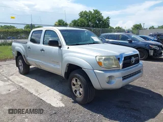 2011 Toyota Tacoma PreRunner z VIN 5TFJU4GN1BX006515, wystawiony jako IAAI lot #42476143 z przebiegiem 107 346 mil mil oraz . Historia ofert i sprzedaży dostępna na DreamBid. Obrazek 1.
