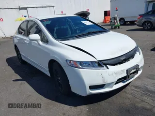 2009 Honda Civic LX z VIN 19XFA16599E044969, wystawiony jako IAAI lot #42030452 z przebiegiem 134 870 mil mil oraz . Historia ofert i sprzedaży dostępna na DreamBid. Obrazek 1.