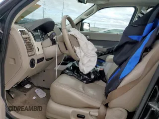 2011 Mercury Mariner Premier с VIN 4M2CN8H7XBKJ02387, выставлен на аукционе Copart как лот 58863855 с пробегом 188 064 миль миль и Списание • Salvage title. История ставок и продаж доступна на DreamBid. Изображение 7.