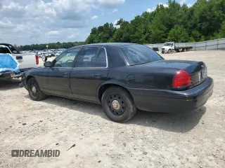 2007 Ford Police Interceptor with VIN 2FAFP71W27X158844, listed as a Copart auction lot 65159955 with 158,906 mi miles and Salvage title. Bid and sale history available at DreamBid. Image 2.
