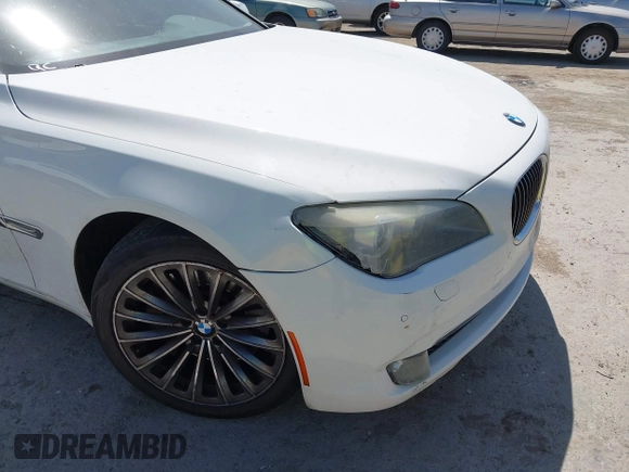 2012 BMW 7 Series 750Li z VIN WBAKB8C52CC963233, wystawiony jako IAAI lot #42332082 z przebiegiem 150 319 mil mil oraz . Historia ofert i sprzedaży dostępna na DreamBid. Obrazek 6.