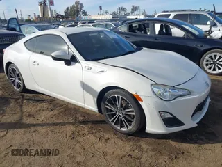 2015 Scion FR-S z VIN JF1ZNAA13F8713996, wystawiony jako IAAI lot #41189792 z przebiegiem 92 730 mil mil oraz . Historia ofert i sprzedaży dostępna na DreamBid. Obrazek 1.
