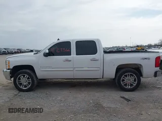 2013 Chevrolet Silverado 1500 LT with VIN 3GCPKSE71DG300433, listed as a IAAI auction lot 41769366 with 210,857 mi miles. Bid and sale history available at carsss.com. Image 14.