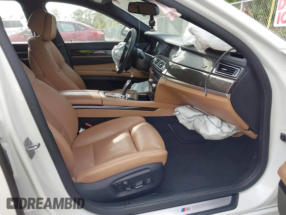 2013 BMW 7 Series 740i with VIN WBAYA6C52DD143862, listed as a IAAI auction lot 41859183 with 133,666 mi miles. Bid and sale history available at carsss.com. Image 5.