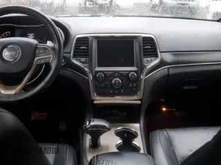 2014 Jeep Grand Cherokee Limited with VIN 1C4RJEBT5EC147459, listed as a Copart auction lot 87828735 with 213,960 mi miles and Clean Title. Bid and sale history available at DreamBid. Image 8.